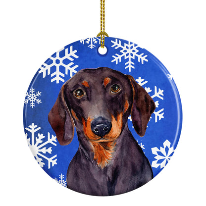 Dog and Winter Snowflakes Ceramic Ornament