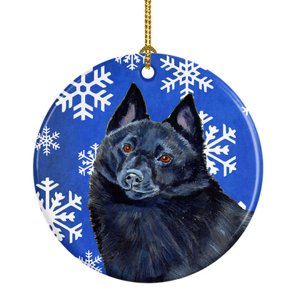 Dog and Winter Snowflakes Ceramic Ornament